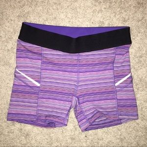 Purple lululemon athletica yoga shorts